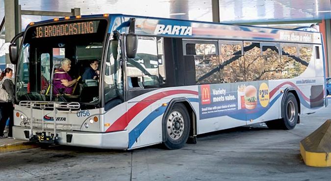 Photo of a BARTA public transit bus picking up passengers